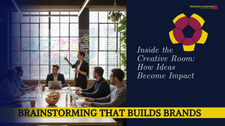 Marketing agency team brainstorming together in a creative workspace.